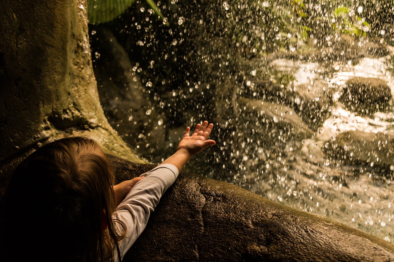 photo of child reaching out