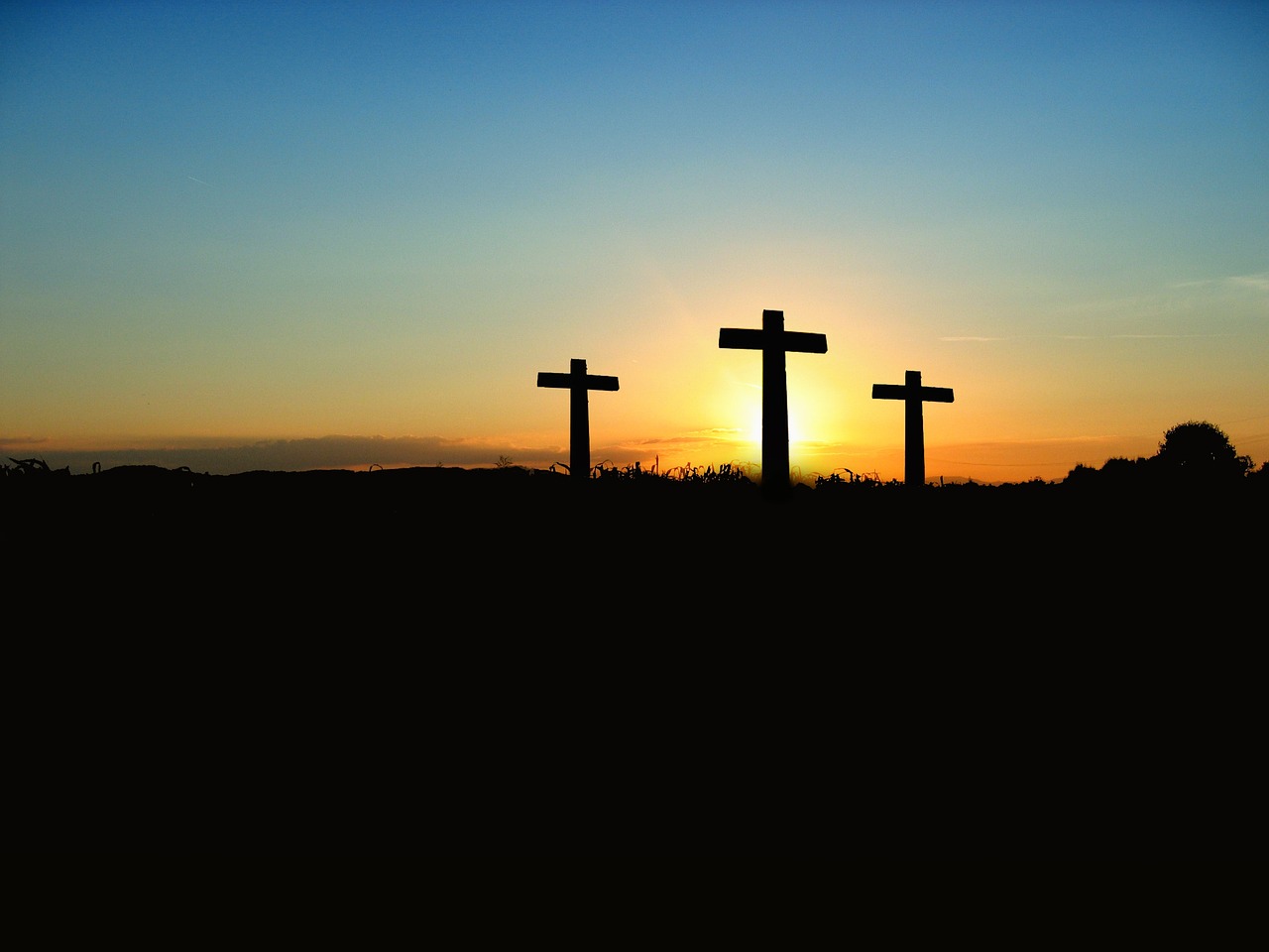 image of three crosses on hightop symbolizing the crucifixion